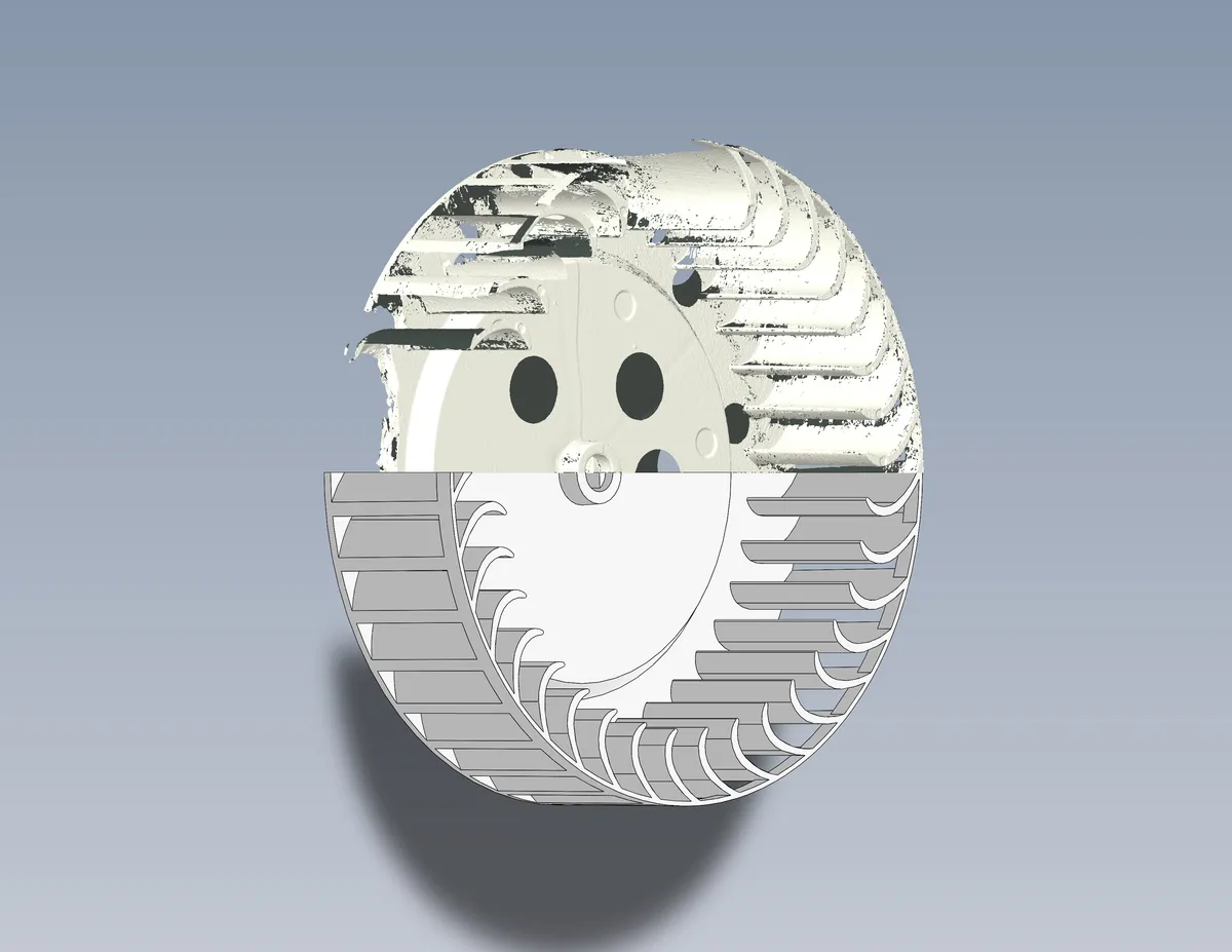 SolidWorks model of the blower fan wheel, with the rebuilt solid model in the lower half overlaid on the raw scan mesh in the upper half